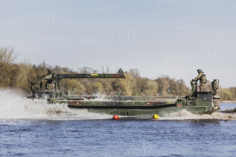 The Bundeswehr's M3 amphibious vehicle forms up in the Elbe as part of the 'Wettiner Schwert' military exercise with German and Czech soldiers near Tangermünde, 26 March 2024. 'Wettiner Schwert' is part of the NATO Quadriga exercise