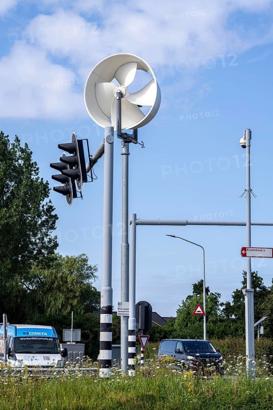 A mini wind power plant in the small Dutch town of Haarlemmermeer supplies the traffic lights at a road junction with electricity, test facility to test the effectiveness of such mini windmills to supply other areas, such as street lighting, with climate-neutral energy, Bennebroekerweg junction, Rijnlanderweg, Netherlands