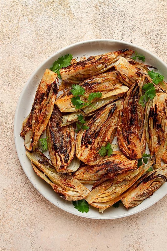 Baked, oven-baked fennel, with spices, in olive oil, homemade, no people