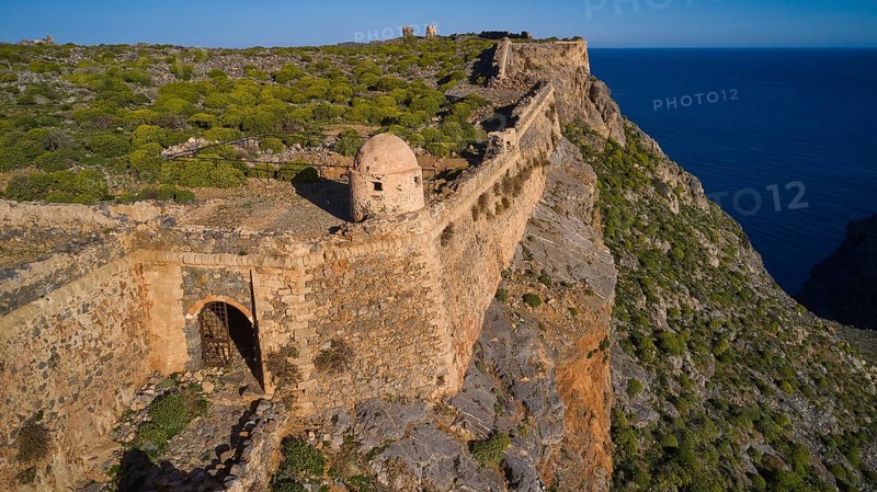 Drone shot, A stony section of a former fortress along a cliff edge overlooking the sea, Venetian sea fortress, Gramvoussa, Gramvoussa peninsula, Pirate Bay, Balos, Lagoon, Northwest Crete, Crete, Greek Islands, Greece, Europe