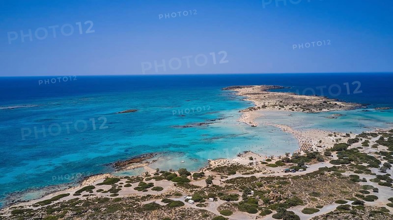 Overtourism, tourists on the beach, parasols, A sandy coast with turquoise sea, a popular nature holiday destination, Elafonissi, lagoon, south-western tip of Crete, Crete, Greek islands, Greece, Europe