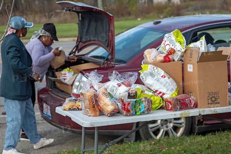 Detroit, Michigan - The nonprofit Forgotten Harvest distributes free food to residents of a low-income neighborhood on the week before Thanksgiving.