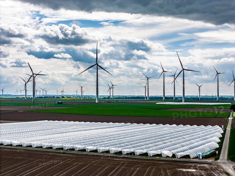 Agriculture, large areas with foil tunnel, for the cultivation of strawberries, freshly cultivated fields, wind farm, south of Lövenich, belongs to Erkelenz, in the district of Heinsberg