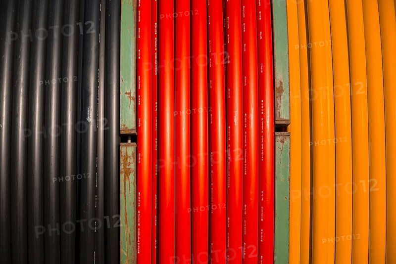 Underground cable, black, red, gold, cable reel