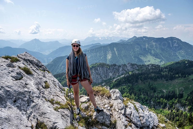Climber with climbing rope on a climbing tour, alpine climbing, crossing the Kampenwand, Chiemgau, Bavaria, Germany, Europe