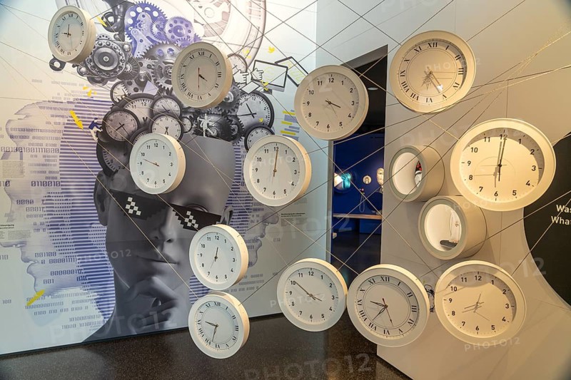 Exhibition with clocks in the interior of the Museum for Future Issues Futurium in Berlin, Germany, Europe