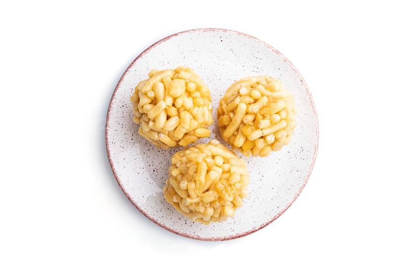 Traditional Tatar candy chak-chak made of dough and honey isolated on white background. top view, flat lay, close up