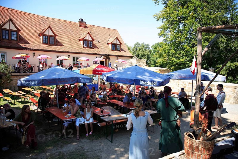 Beer garden at Königsberg Castle, a medieval imperial castle overlooking the town of Koenigsberg in Bavaria, Hassberge district, Lower Franconia, Bavaria, Germany, Europe