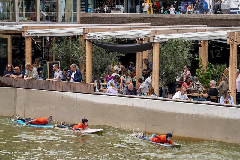 Surfing facility in the city centre of Rotterdam, Rif010, supposedly the world's first wave facility for surfers in a city, in the Steigersgracht, a 130 metre long and 21 metre wide wave pool was built in the existing canal, waves up to 1.5 metres high can be generated, every 7 seconds a wave breaks for the surfers, the 4.5 million litres in the pool, water is moved by 8 wave machines, Netherlands