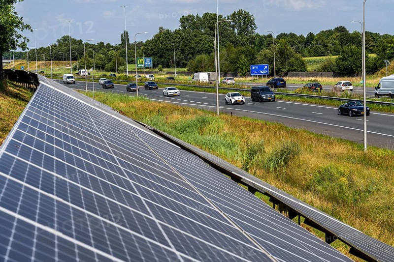 A58 motorway, photovoltaic systems were installed on the slopes to the side of the carriageway, use of the areas along the roads as a solar park, near Etten-Leur, Noord-Brabant, Netherlands