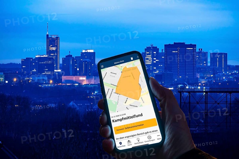 Symbolic image for NINA Warnapp, the Federal Office of Civil Protection and Disaster Assistance, warns the user of various dangers, disasters, storms, explosive ordnance, Essen, Germany, Europe