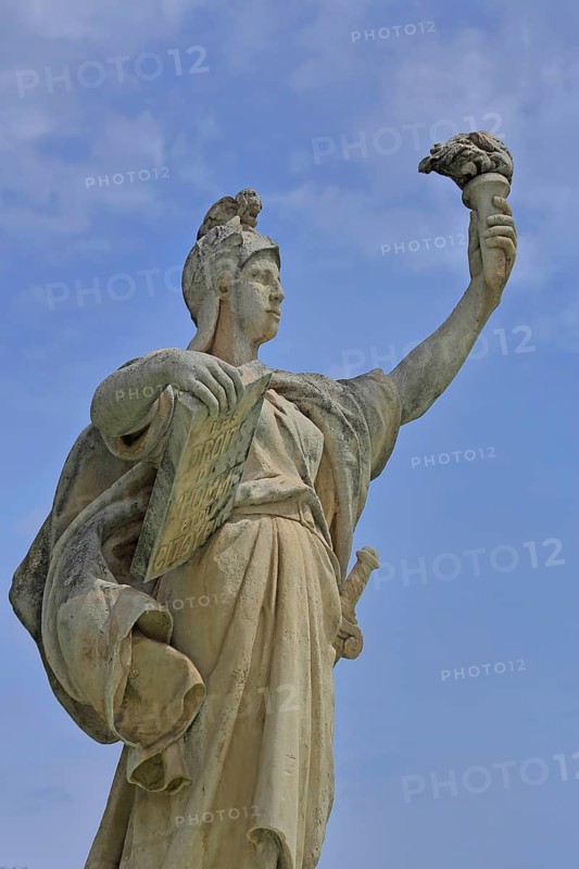 Sculpture Statue of Liberty at the Fontaine de la Fédération built in 1890, allegory, Republic, French, arm, high, up, gesture, torch, book, plaque, carry, hold, freestanding, Liberty Square, Federation, Place de la liberte, Toulon, Var, Provence, France, Europe