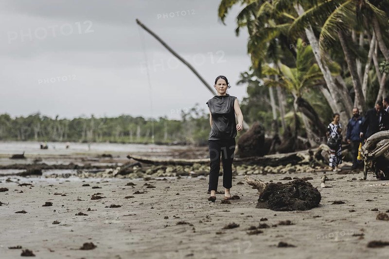 Annalena Bärbock (Bündnis 90/Die Grünen), Federal Foreign Minister, photographed during a briefing on coastal erosion at a cemetery near the settlement of Togoru, flooded by rising sea levels, 07.05.2024. Bärbock is travelling to Australia, New Zealand and Fiji for political talks / Photographed on behalf of the Federal Foreign Office
