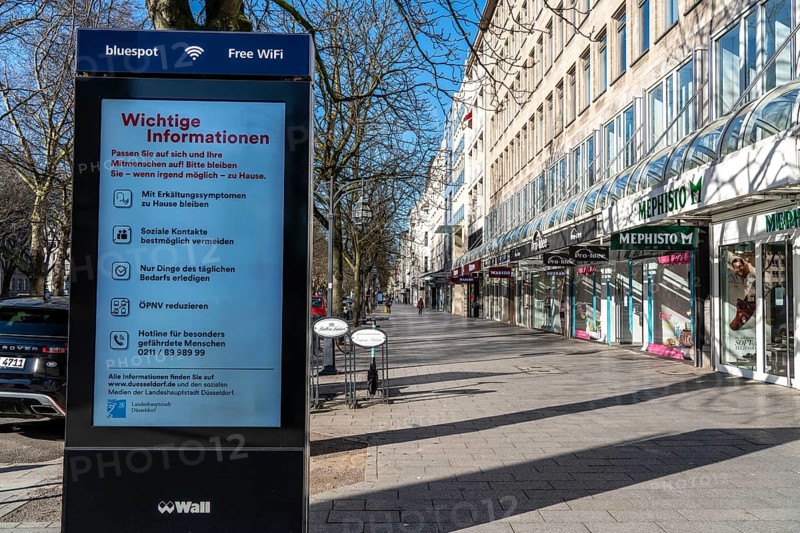 Advertising displays, on Königsallee, Kö, give advice on correct behaviour, empty city centre, shopping street, effects of the coronavirus pandemic in Germany, Düsseldorf