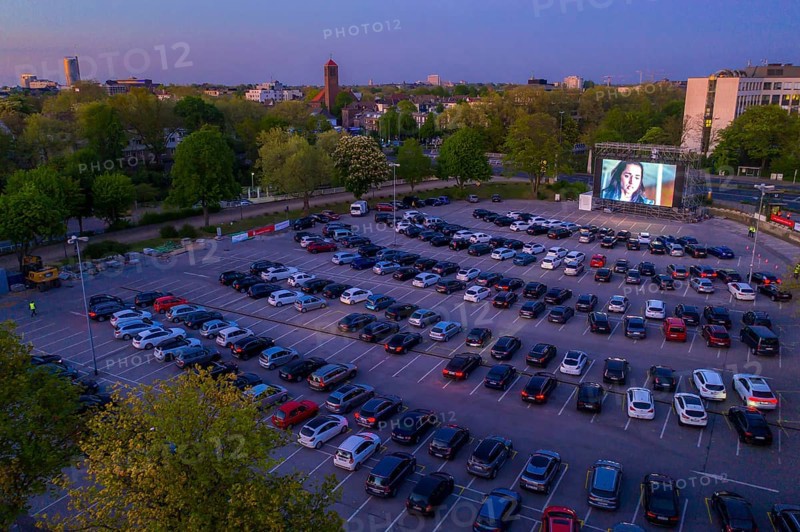 Temporary drive-in cinema, in the car park in front of Messe Essen, Grugahalle, large LED screen, in the Rüttenscheid district, effects of the corona crisis in Germany