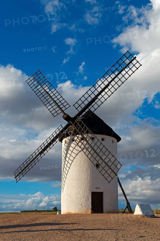 A windmill in front of an impressive sky full of clouds, Campo de Criptana, Ciudad Real province, Castilla-La Mancha, Don Quixote Route, Spain, Europe