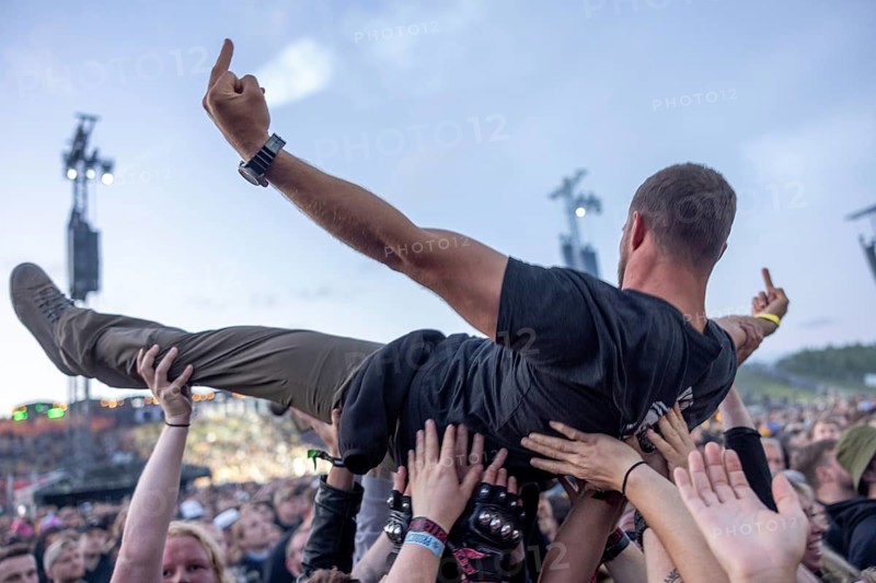 Copenhagen, Denmark - 19.6.2024: Festivalgoers crowdsurfing at the Copenhell Metal Festival at Kløverparken Camping Copenhagen, Denmark. The festival will take place from 19-22 June 2024