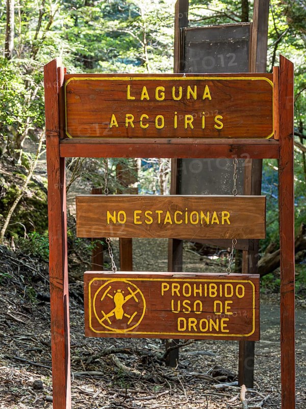 Information sign at the Laguna Arcoiris, drone use not allowed, parking forbidden sign, Conguillio National Park, Chile, South America