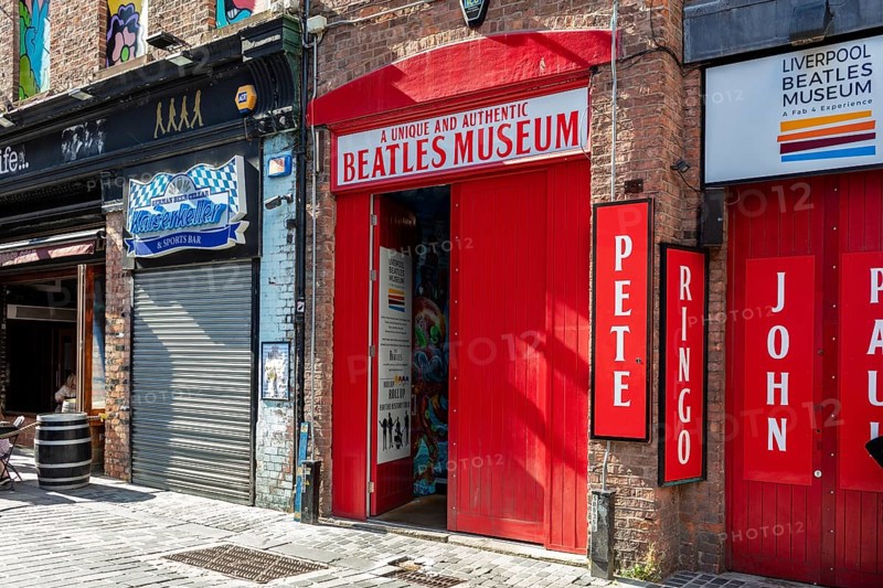 Entrance to the Beatles Museum with striking red sign, Liverpool
