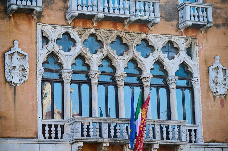 View from 'Canal Grande' on to the Windows in an old house 'Corte di appello di venezia' in Venice on a sunny day in winter, Italy, Europe