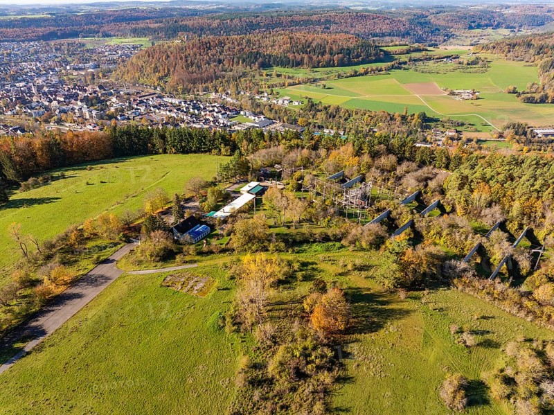 Wide landscape with autumn colours, fields and a small village in hilly surroundings, high ropes course, Nagold, Black Forest, Germany, Europe