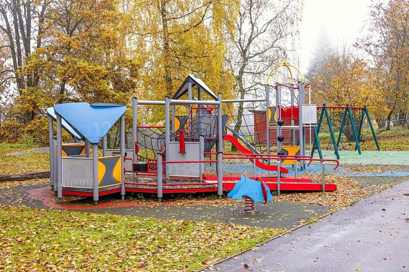 Empty playground with a climbing frame a autumn day in a park