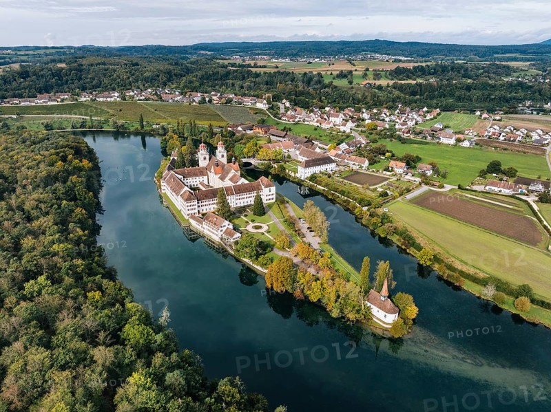 Aerial view of the former Benedictine abbey with the monastery church of St Mary and the pointed church of St Magdalena on the Rhine island of Rheinau, Andelfingen, Canton Zurich, Switzerland, Europe