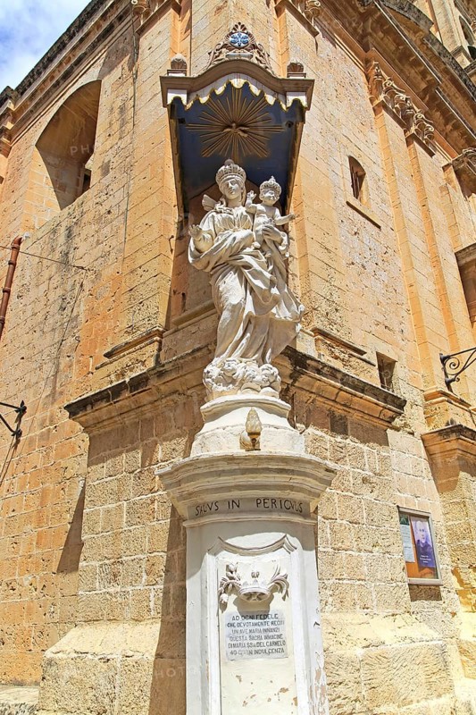 Madonna and baby Jesus Christ statue, Carmelite church and priory in medieval city of Mdina, Malta, Europe