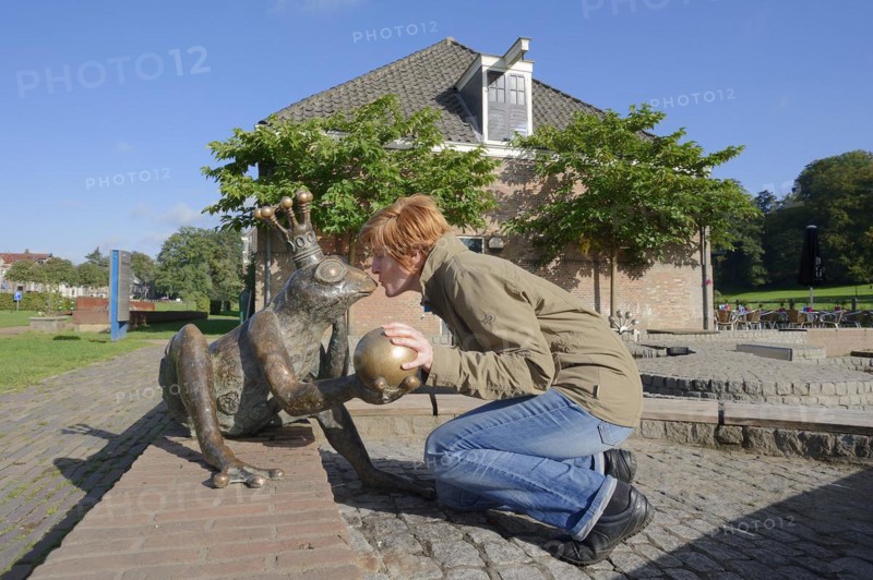 Woman kissing frog king figurine, Dutch Water Museum, Arnhem, Gelderland, Netherlands
