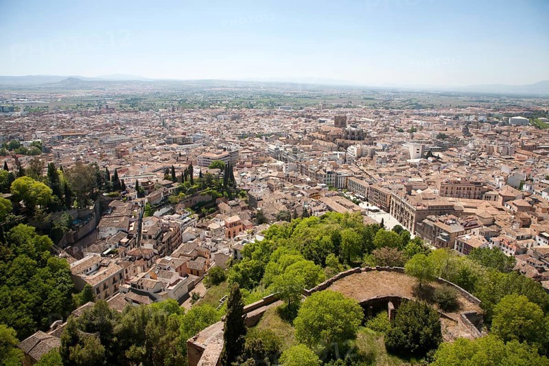 View of city centre and historic Moorish buildings in the Albaicin district of Granada, Spain seen from the Alhambra