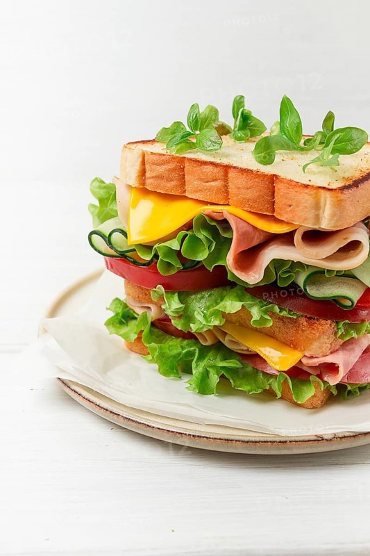 Club sandwich, on a white table, close-up, no people, horizontal, homemade