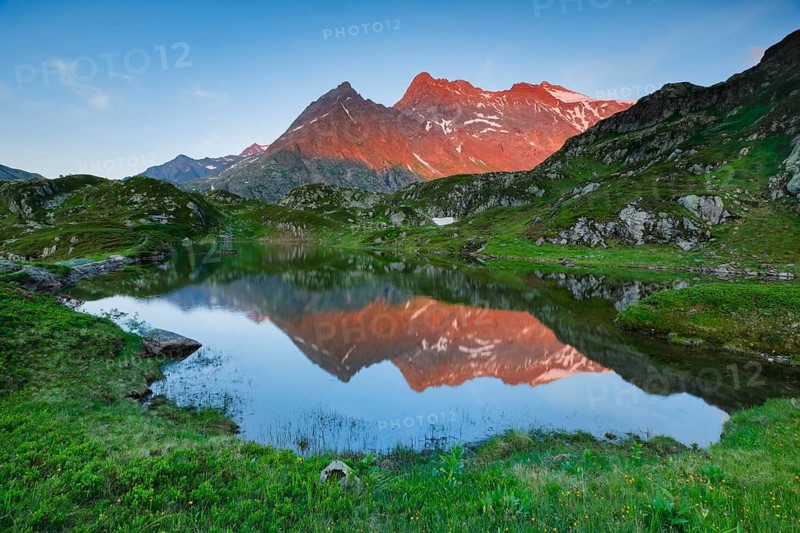 Chli Sustenhorn and Sustenhorn reflected in the Seebodensee, Canton Bern, Switzerland, Europe