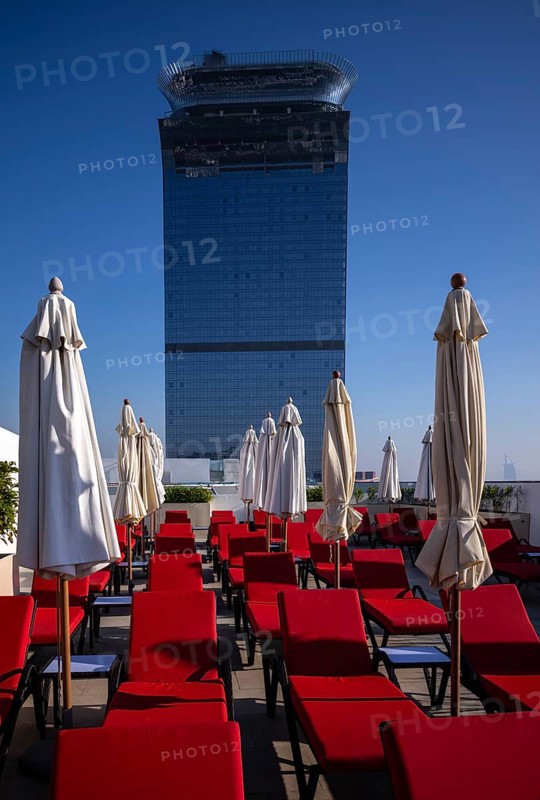 Deckchairs, sunshades, view from Rooftop Terrace Hotel NH Collection The Palm to Hotel St. Regis, The View At the Palm, Palm Jumeirah, Dubai, United Arab Emirates, VAR, Asia