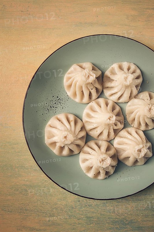 Traditional Georgian dish, Khinkali, Kalakuri, top view, rustic style, no people