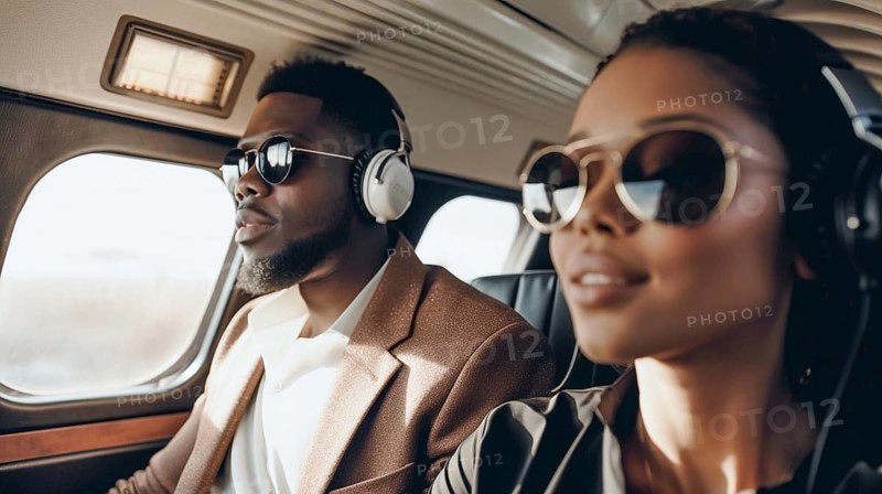 Young successful adult african american couple in their private executive luxury jet, generatvie AI, AI generated