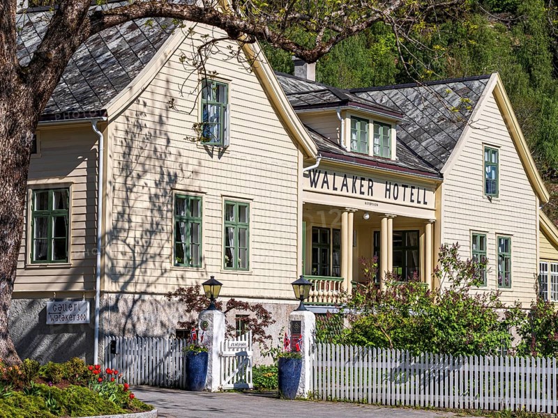 Decorated entrance of the traditional Walaker hotel, village Solvorn at the Sognefjord, Norway, Europe