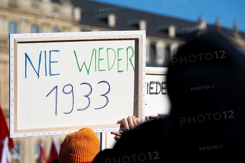 Pictures taken during the demonstration Haltung zeigen! against Nazi deportation plans of the AfD on the Schlossplatz in Stuttgart, 20.01.2024. A sign with the inscription Never again 1933