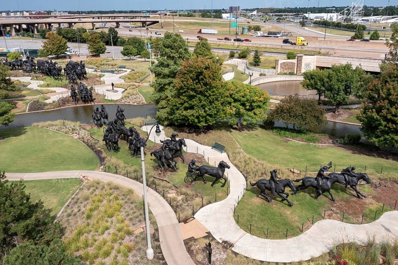 Oklahoma City, Oklahoma - A sculpture commemorates the Oklahoma Land Run of 1889 when thousands of settlers were allowed to enter former Indian Territory and stake claims to the land. The sculpture, by artist Paul Moore, includes 45 figures stretching 365 feet along the Bricktown Canal.