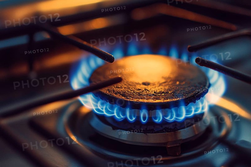 Close up of kitchen gas oven with burning flames. Generative Ai, AI generated