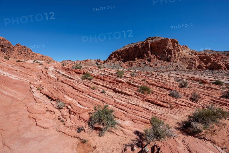 Layered rock formations along the Fire Wave Trail at Valley of Fire State Park near Overton, Nevada