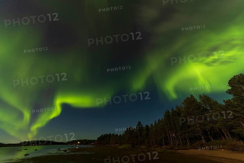 Northern lights, (Aurora borealis) at a lake near Kiruna, September 2024, Lapland, Sweden, Europe