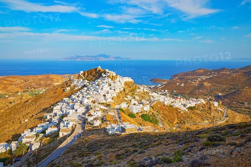 View of Chora village and the port of Livadi and Sifnos island in the distance, Chora, Serifos Island, Cyclades Islands, Greece, Europe