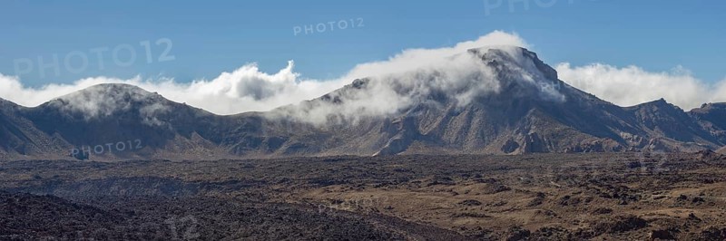 The summit of Montaña Guajara, also: Alto de Guajara, 2715m, crater walls, Caldera de las Cañadas, a huge volcanic cauldron, Teide National Park, Parque Nacional del Teide, at sunrise, Tenerife, Canary Islands, Spain, Europe