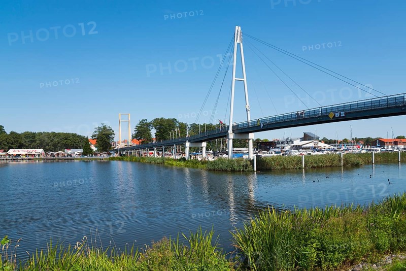 A modern bridge spans the water, surrounded by natural and urban elements, harbour and pier, Gizycko, Warminsko-Mazurskie, Warminsko-Mazurskie, Poland, Europe