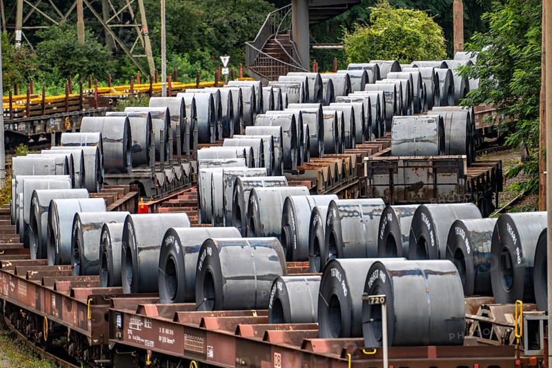 Strip steel coils, on freight wagons, at the ThyssenKrupp Steel plant Schwelgern in Duisburg-Marxloh is part of the Bruckhausen steelworks, North Rhine-Westphalia, Germany, Europe
