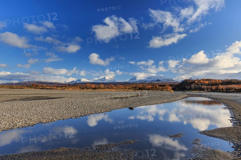 Clouds reflected in lake, autumn colours, sunny, mountains, Lapporten, Abisko National Park, Laponia, Lapland, Sweden, Europe