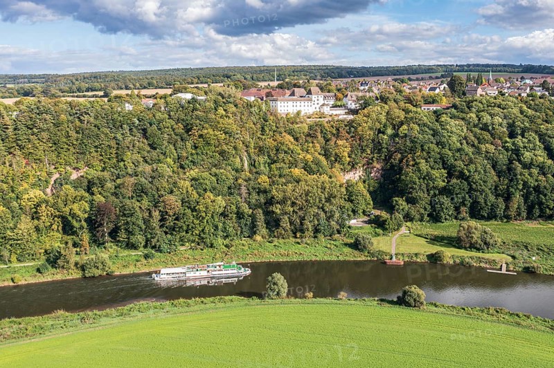 Aerial view of excursion boat on the Weser river passing castle Fürstenberg, Weserbergland, Germany, Europe