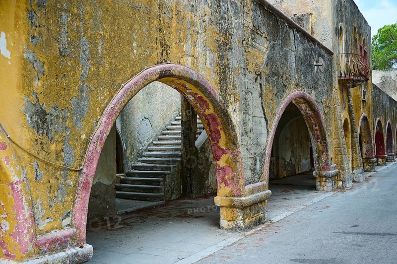 An old wall accompanied by arches showing signs of historical decay and deterioration, Italian Governor's Palace, Ruins, Italian colonial settlement, Eleousa, Rhodes, Dodecanese, Greek Islands, Greece, Europe
