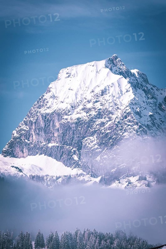 Prominent snowy mountain peak against a clear blue sky, Kaisergebierge, The Mountain Doctor, Elmau, Austria, Europe