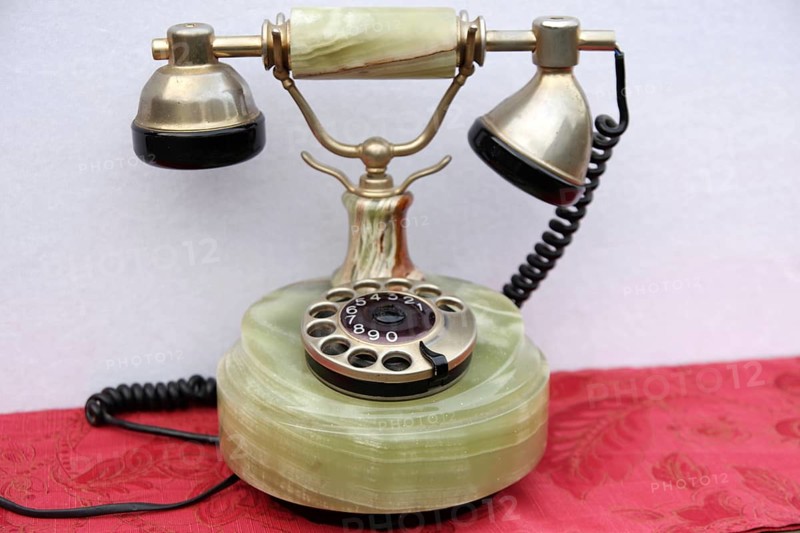 Telephone, antique, marble, dialling disc, nostalgia, ancient telephone with traces of use, a marble find with a receiver lying on a telephone fork